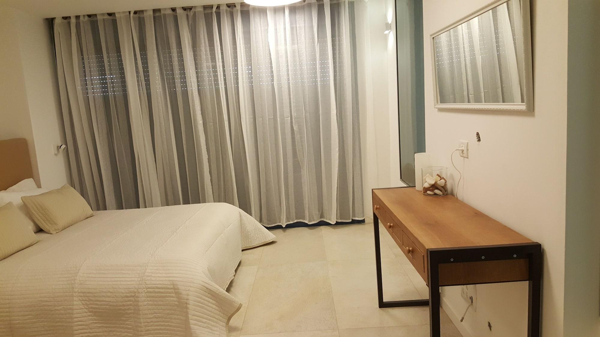 Andromeda Hill Apartments And Spa เทลอาวีฟ ภายนอก รูปภาพ