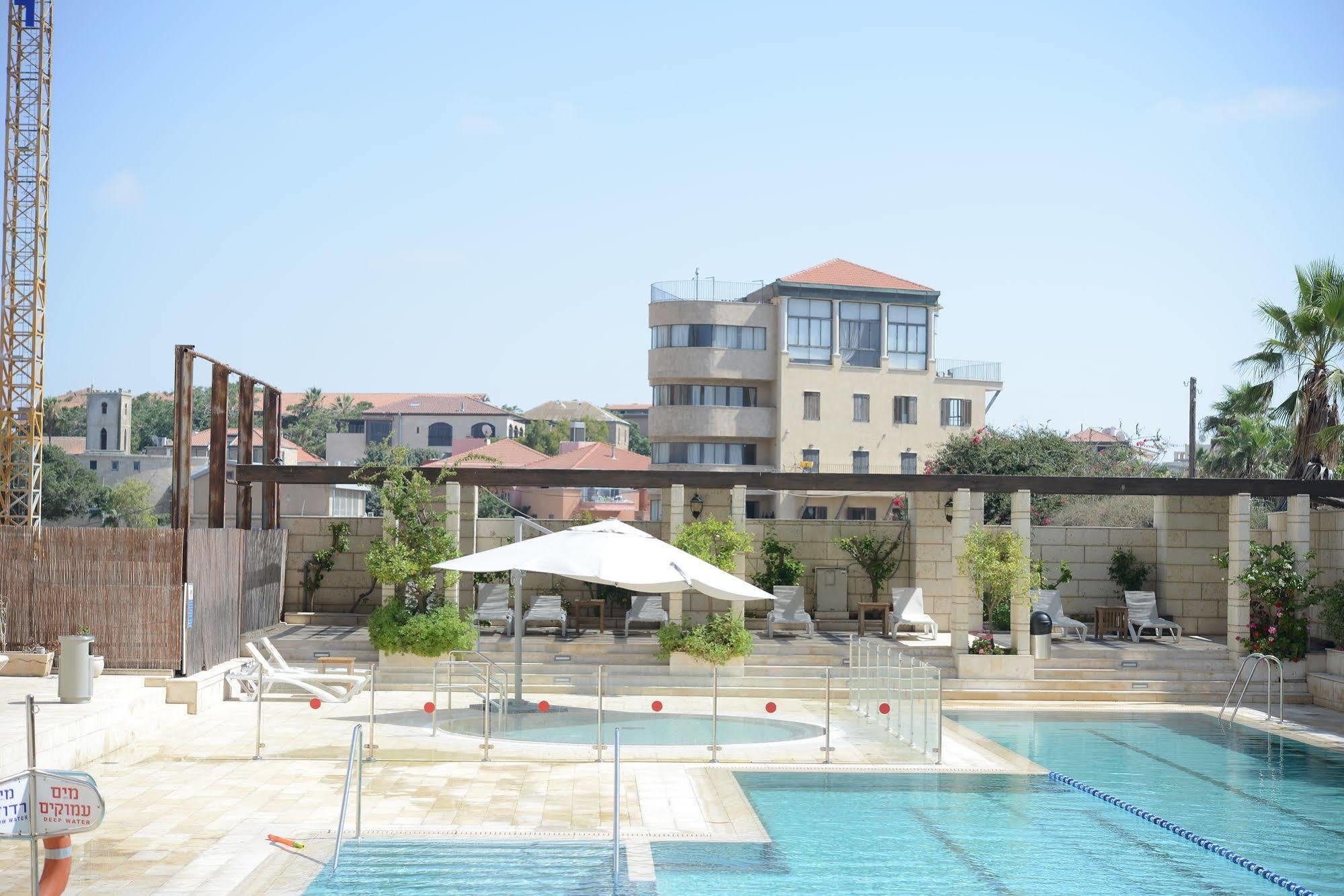 Andromeda Hill Apartments And Spa เทลอาวีฟ ภายนอก รูปภาพ