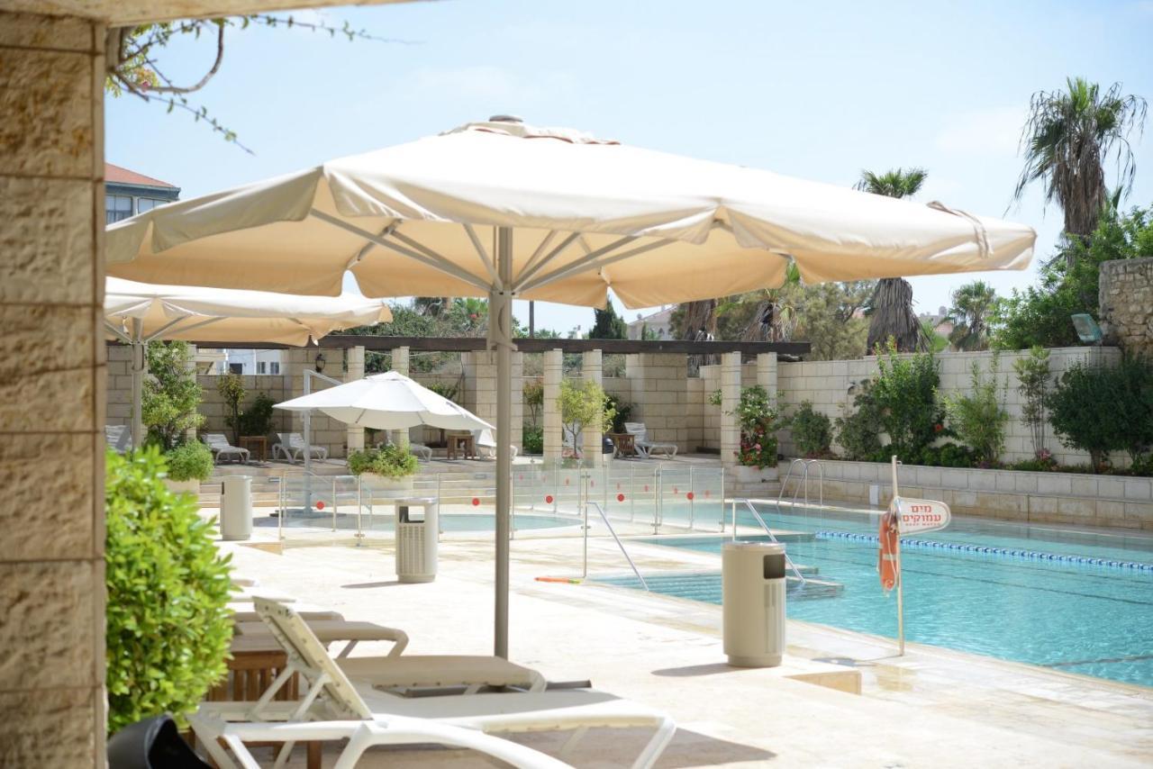 Andromeda Hill Apartments And Spa เทลอาวีฟ ภายนอก รูปภาพ